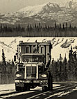 Truck on the Alaska Highway in winter.