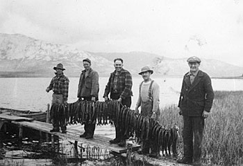 Civilian contractors with their catch, Teslin area