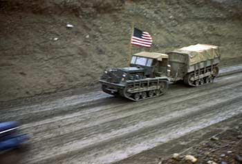 Leader of light tractor convoy traveling the Alaska Highway. ca. 1943-1944.