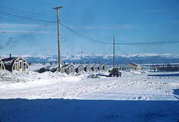 Igloos, otherwise known as Quonset huts, at Camp Canol. February 1944.