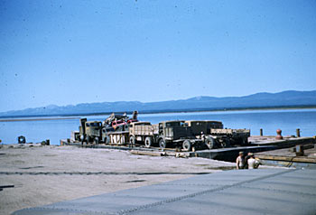 Loading barges at Camp Canol on the Mackenzie River, July 1944.