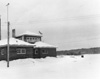 Watson Lake airport control tower and a U.S. Army C-47 (military DC-3). February 7, 1943.